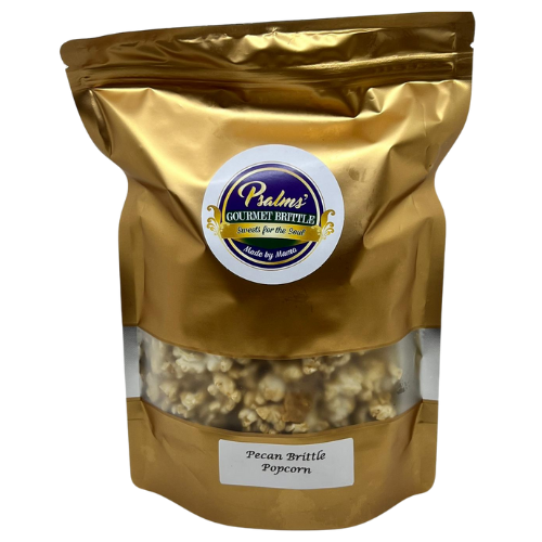Psalms Gourmet Pecan Brittle Popcorn featuring premium popcorn clusters coated in handcrafted pecan brittle with generous pieces of pecans
