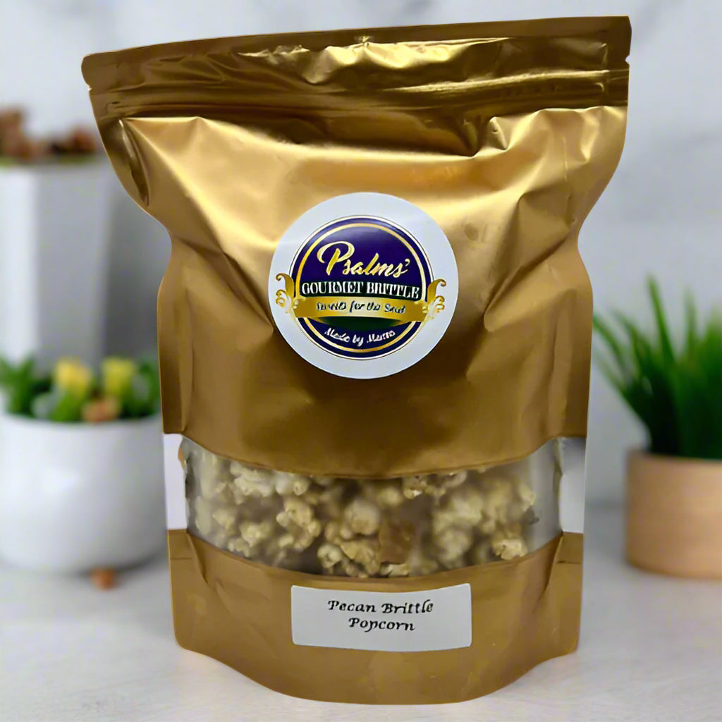 Psalms Gourmet Pecan Brittle Popcorn featuring premium popcorn clusters coated in handcrafted pecan brittle with generous pieces of pecans