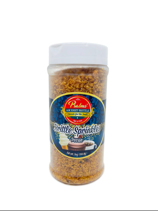 Psalms Gourmet Pecan Brittle Sprinkles featuring perfectly crushed golden brittle pieces with premium Georgia pecan bits in a clear resealable jar